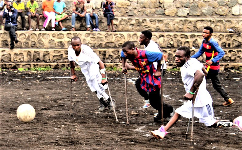 People with walking disabilities playing soccer